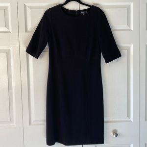 Black formal wool dress by J’Envie New York. No visible signs of wear.